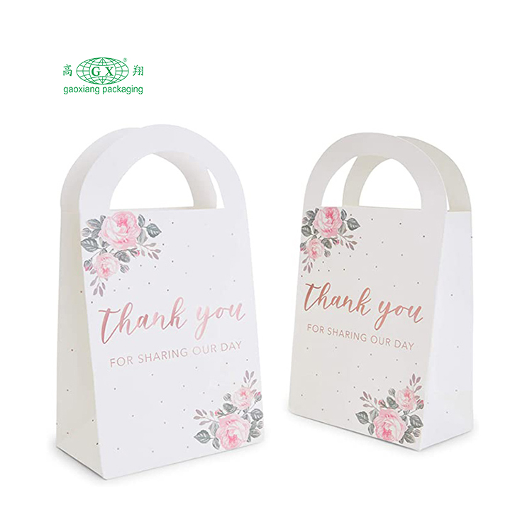 Venta al por mayor de bolsas de papel de boda de embalaje de regalo personalizadas gracias de alto grado