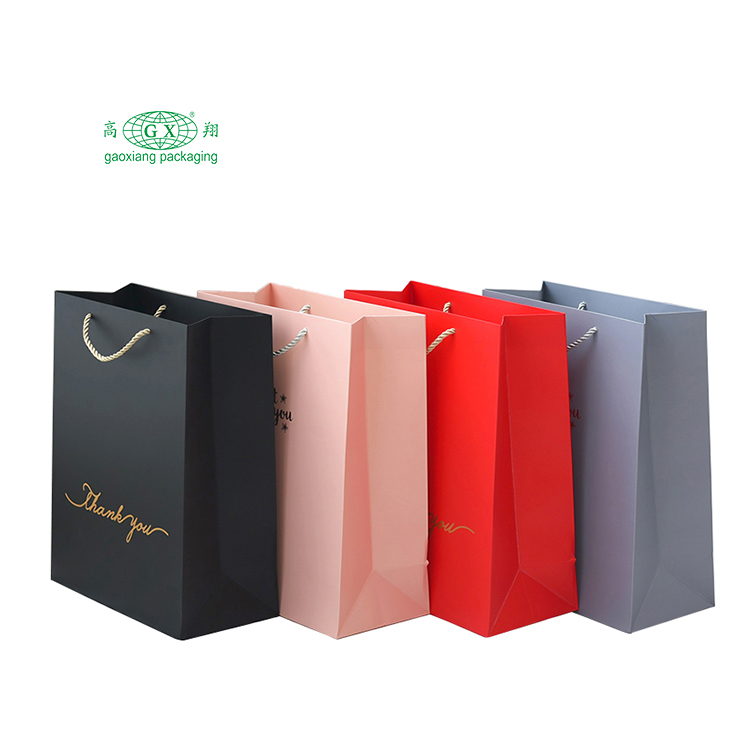 Bolsos de compras de papel con logotipo personalizado al por mayor, bolsas de regalo de papel de Navidad