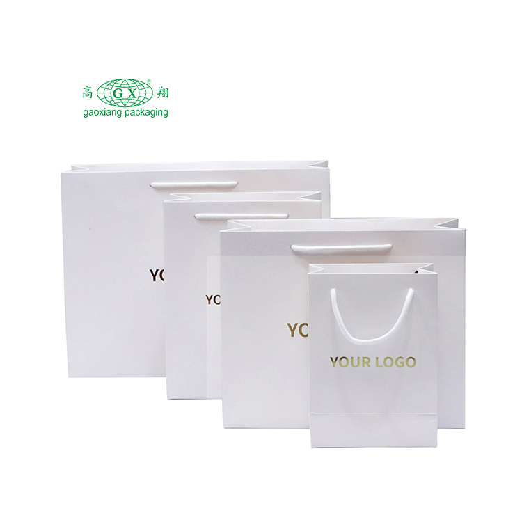 Bolsas de compras personalizadas, ropa, diseño de logotipo impreso en oro, bolsas de embalaje de papel de cartón blanco para venta al por menor