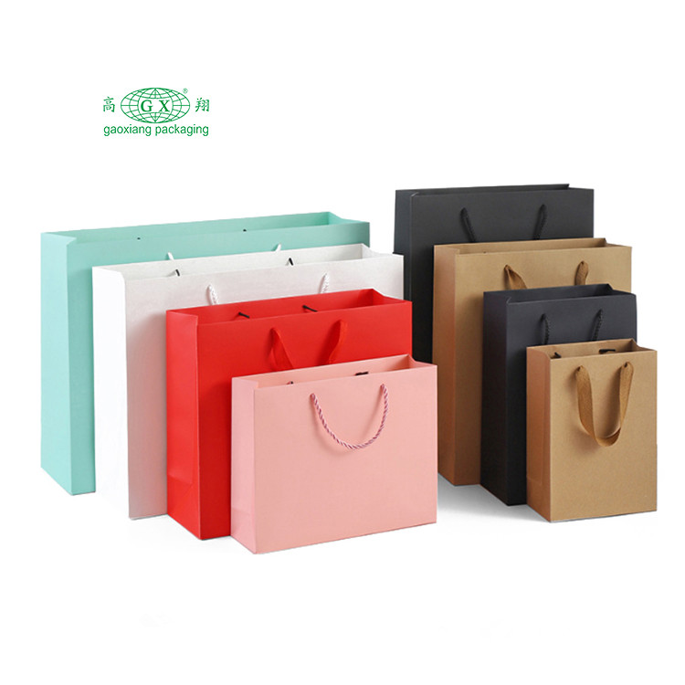 Bolsas de compras de papel kraft de lujo, color rosa, negro, blanco, personalizadas, al por mayor, con logotipo